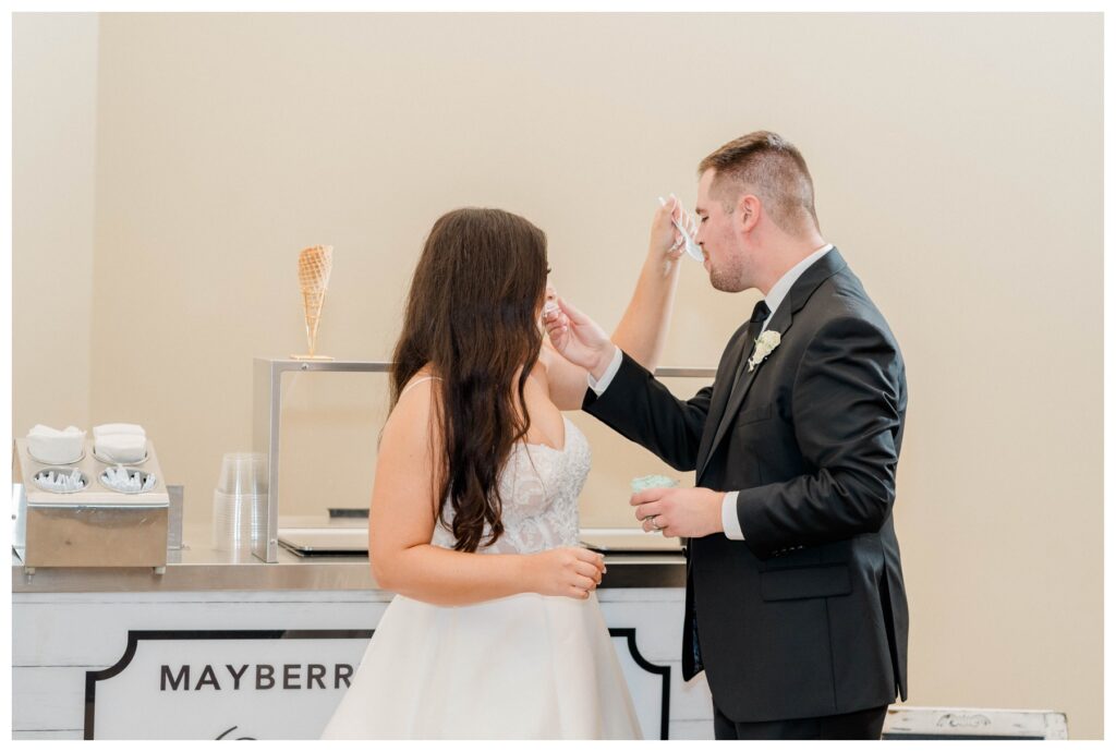 hanah and mike sharing ice cream together at Parkway Place Venue, Toledo Ohio Wedding 