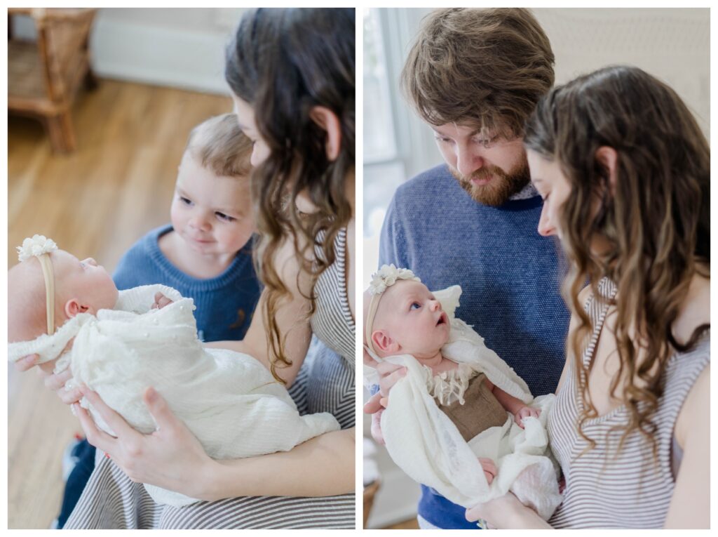 Parents holding their newborn during a milestone photography session in Columbus